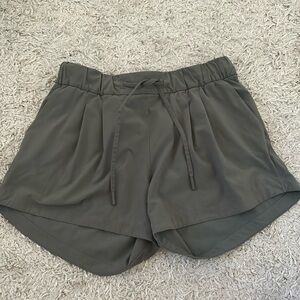 Size 4 Lululemon Stroll at Sundown shorts in green. Worn